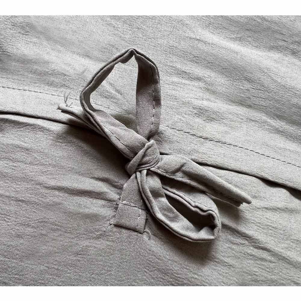 Tie Detail On The Peachskin Cushion Cover Reverse